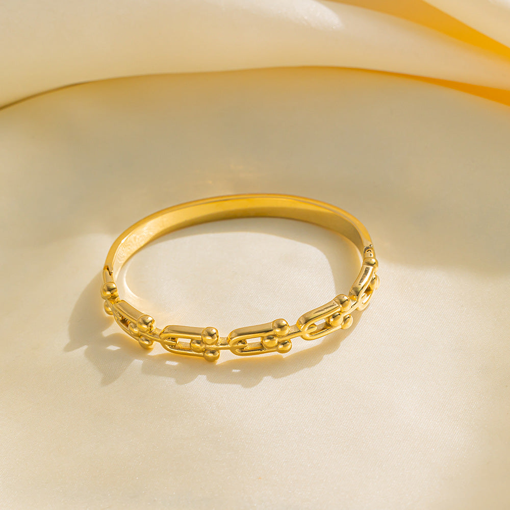 Bracciale minimalista a ferro di cavallo a U in acciaio al titanio con finitura liscia elettrolitica sottovuoto