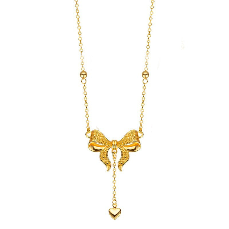 Elegante collana a clavicola in acciaio al titanio stile principessa con ciondolo a cuore, fiocchetti e dettagli a frange su catena a maglie O-ring