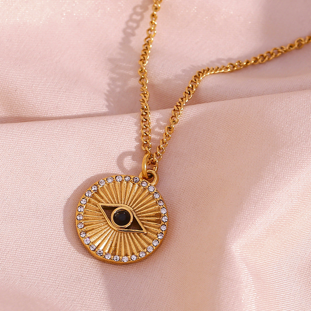 Minimalist Black Eye Pendant Necklace in Stainless Steel with 18K Gold Plating and Rhinestone Inlay, Sunburst Coin Shape
