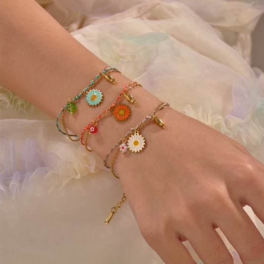 Elegante pulsera trenzada de acero inoxidable con forma de flor Margarita para mujer con acabado chapado