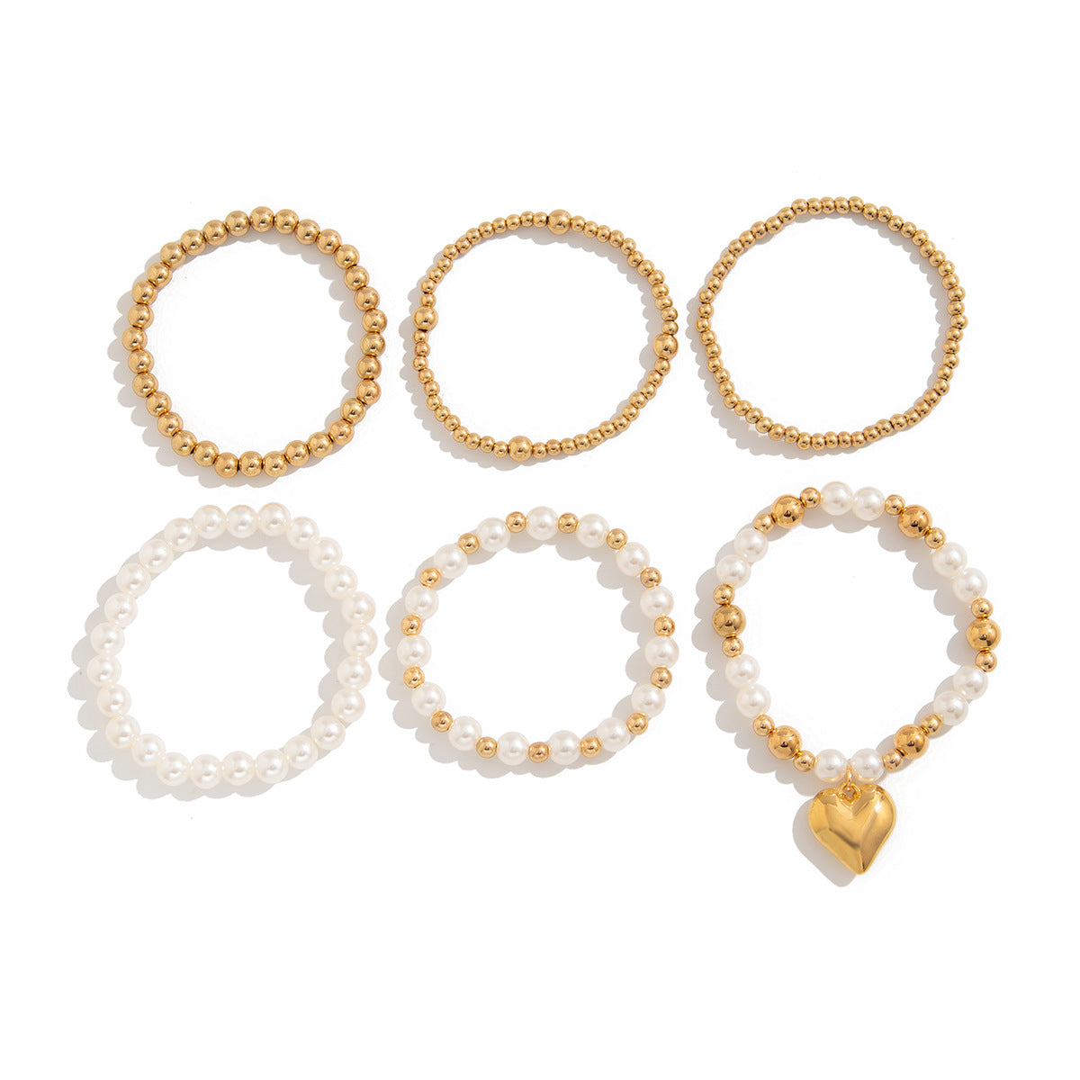 Pulsera elástica minimalista para mujer con perla de imitación en forma de corazón y acabado chapado, ideal para combinar con otras joyas