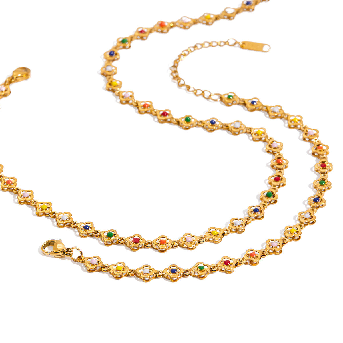 Set di Collana e Bracciale in Acciaio al Titanio con Finitura Placcata a Motivo Floreale da Donna