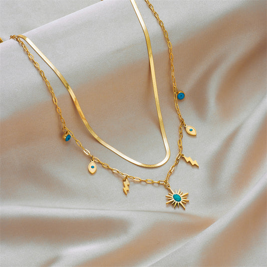 Collana con pendente a fulmine retrò minimalista turchese a forma di occhio in acciaio al titanio con finitura placcata per donna