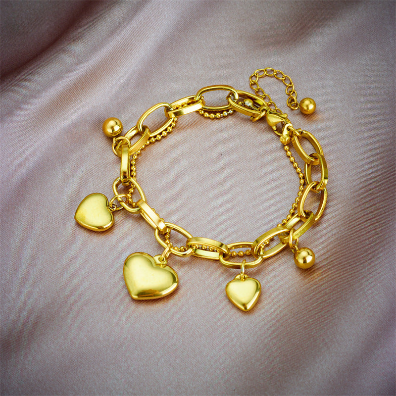 Bracciale vintage a cuore placcato in acciaio al titanio con design a catena multistrato da donna