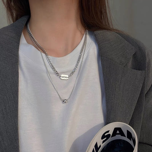 Collar minimalista de doble capa con cuentas redondas geométricas para mujer, colgante de cadena cubana de acero de titanio con acabado chapado
