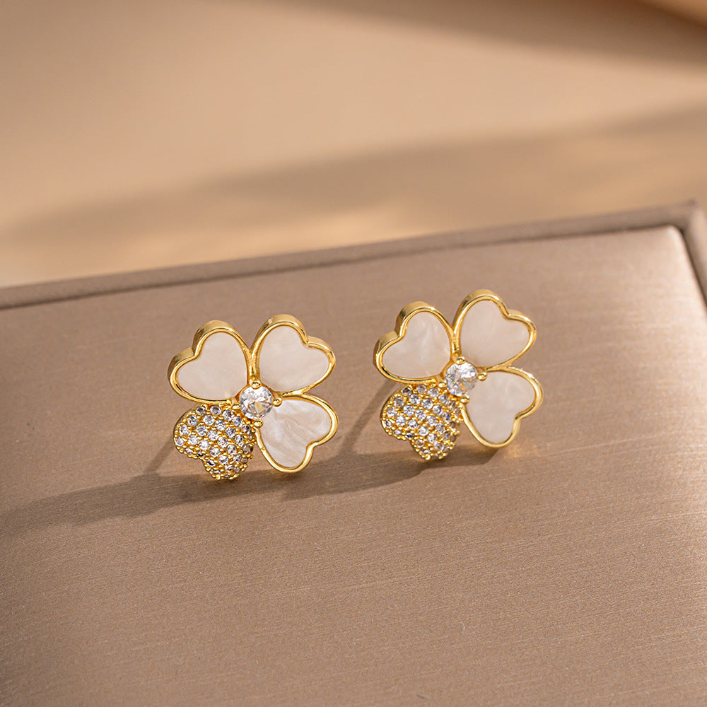 Orecchini a perno Saturno minimalisti color oro in ottone con zirconi per donna