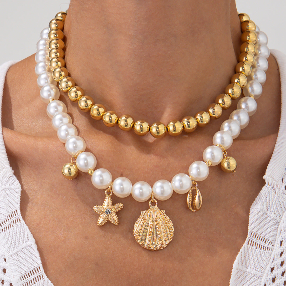 Collana da donna con ciondolo a stella in lega stile vacanza minimalista, finitura galvanizzata e perline in madreperla
