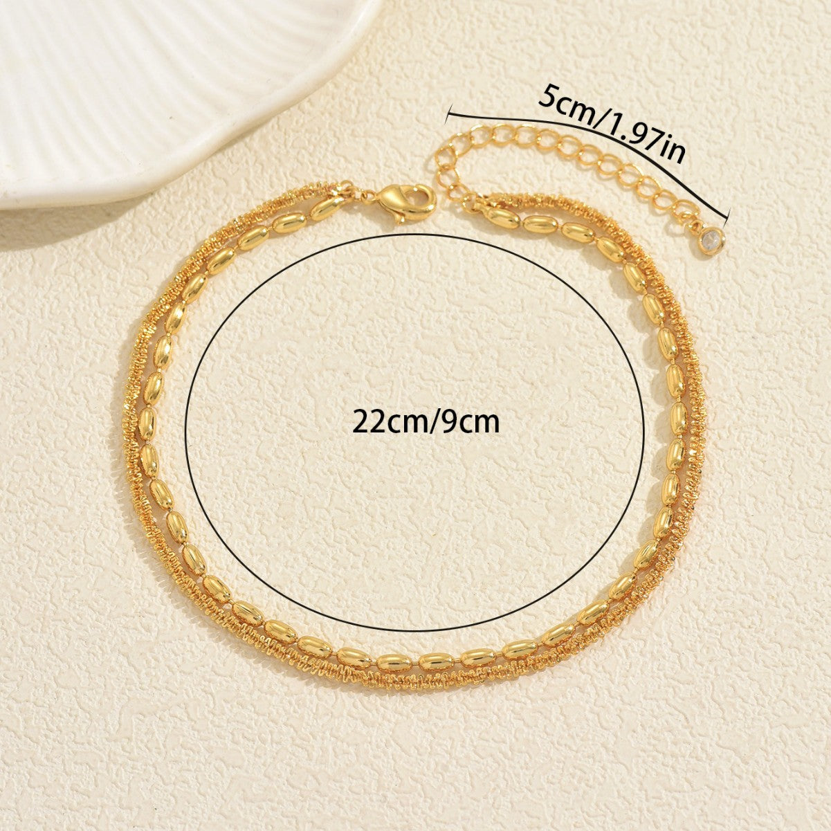 Tobillera geométrica multicapa para mujer hecha de cobre con diseño minimalista moderno y estilo elegante y versátil