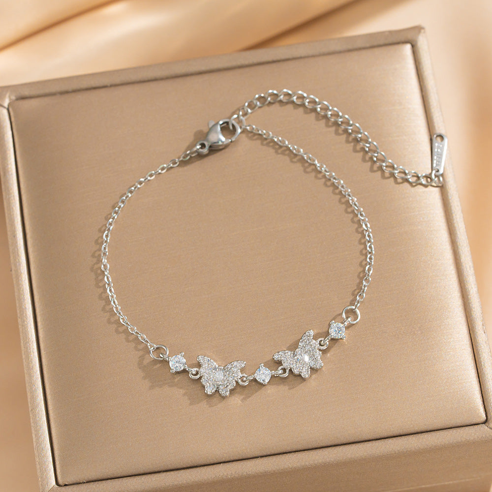 Bracciale vintage di lusso francese regolabile a forma di fiocco con intarsi in zircone e rame placcato in oro 18 carati
