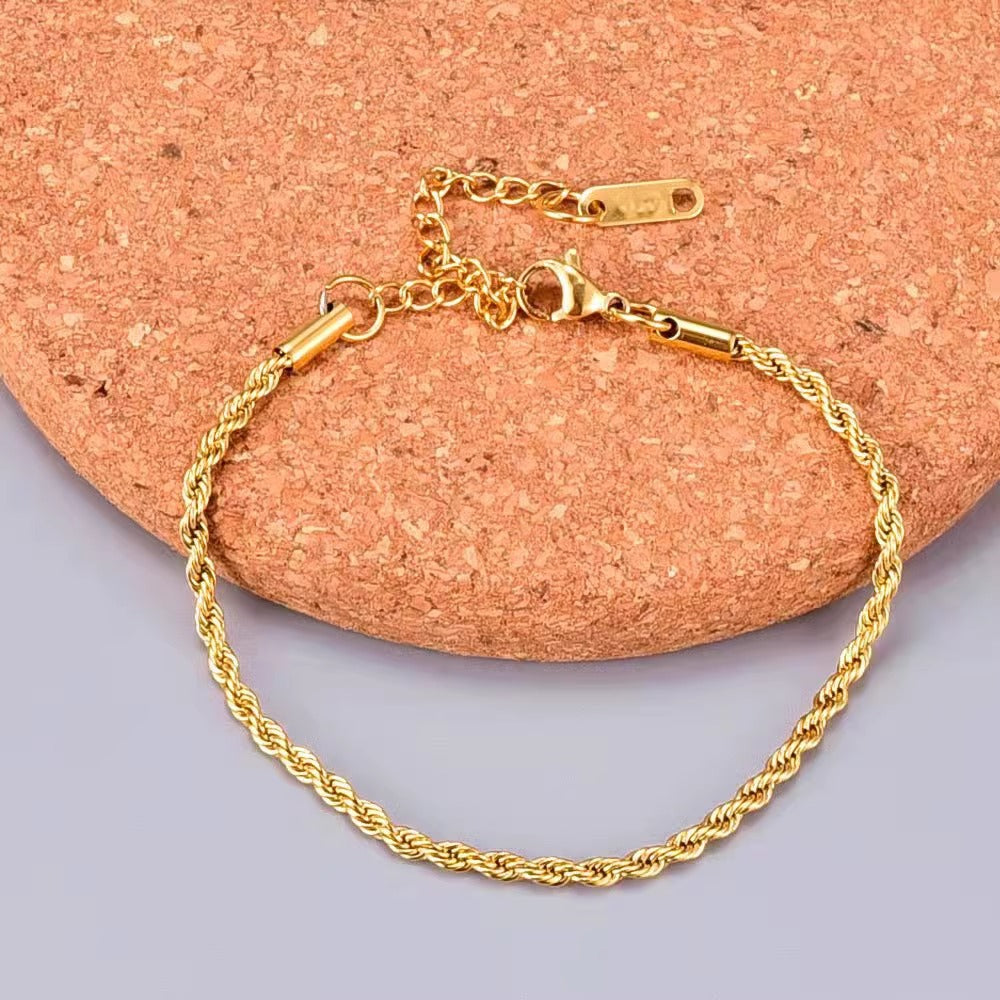 Bracciale da donna a catena a spirale in lega di rame placcato oro 18K con motivo a foglia, dal design originale e minimalista