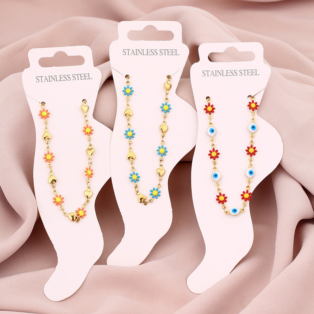 Elegante cavigliera geometrica in acciaio inossidabile da donna con motivo a petalo e occhio, accessorio di moda di lusso minimalista