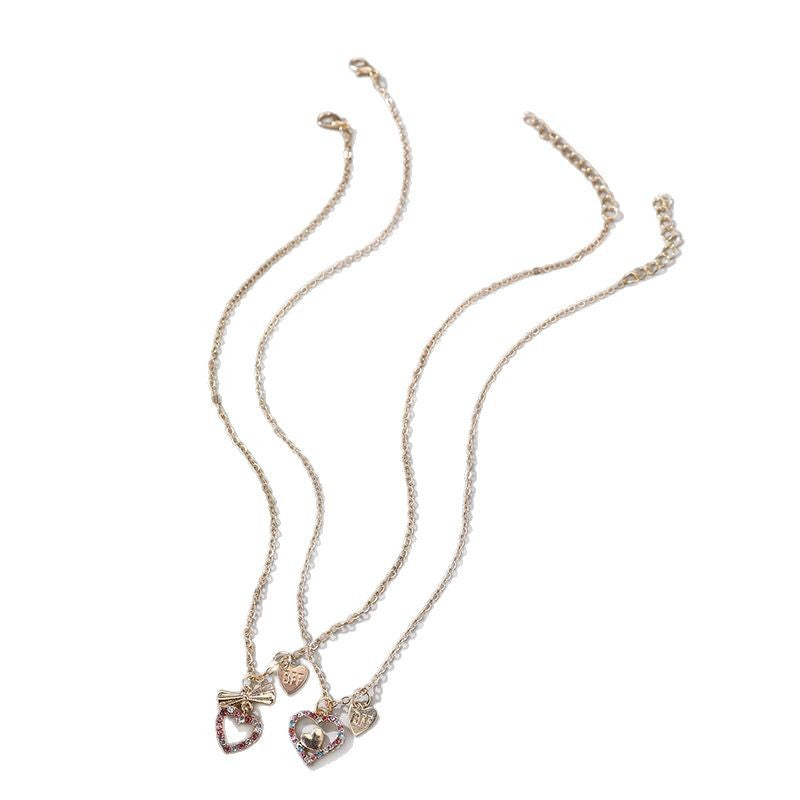 Collana minimalista a forma di fiocco in lega con ciondolo a gatto in resina e finitura smaltata per bambine dai 3 ai 10+ anni