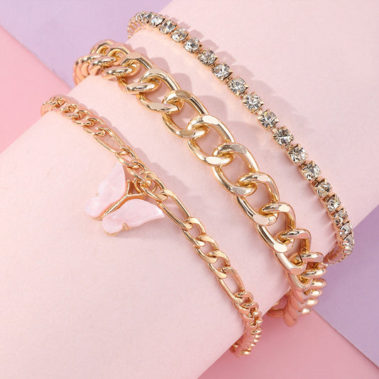 Pulsera de aleación con forma de mariposa estilo punk con incrustaciones de diamantes de imitación y acabado esmaltado para mujer