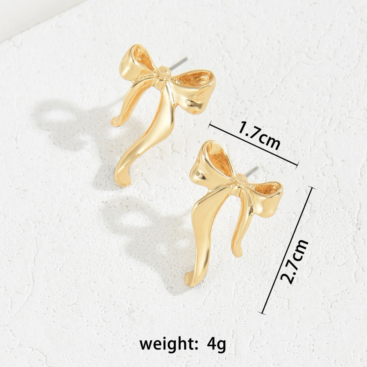 Orecchini a perno da donna a forma di fiocco minimalisti in lega placcati oro con perni in acciaio inossidabile