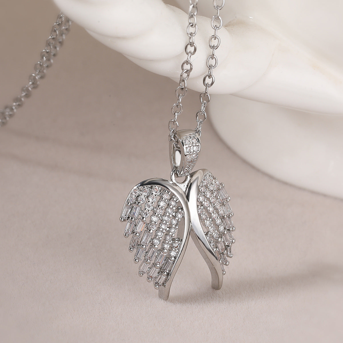 Minimalist Angel Wing Pendant Necklace for Women in Copper with 18K Gold Plating and Zircon Inlay, Irregular Geometric Locket Chain