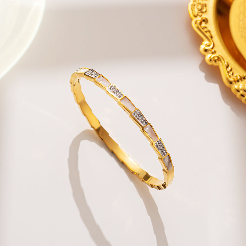 Bracciale Minimalista in Acciaio Inossidabile da Donna con Placcatura in Acciaio al Titanio e Intarsio di Strass a Forma Geometrica Ovale