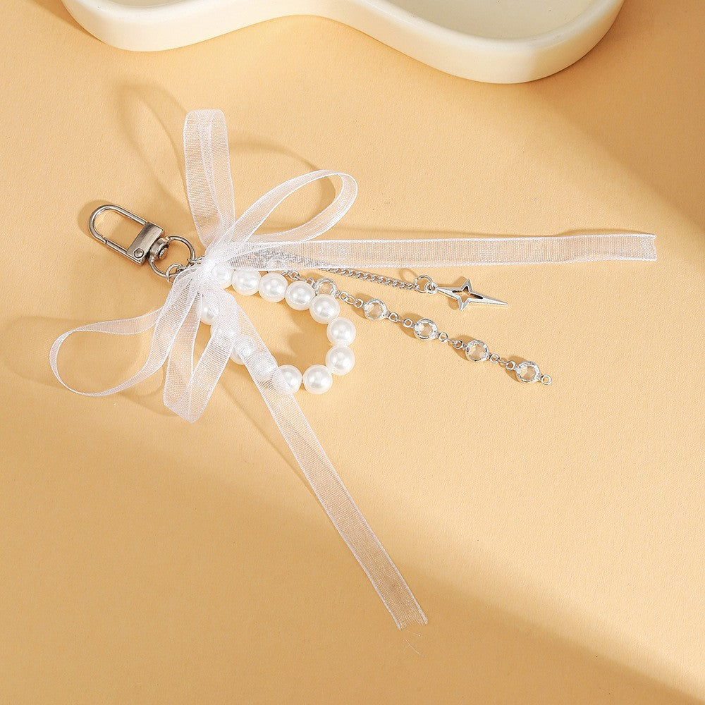 Sweet Cartoon Bow Pearl Zinc Alloy Keychain Bag Charm