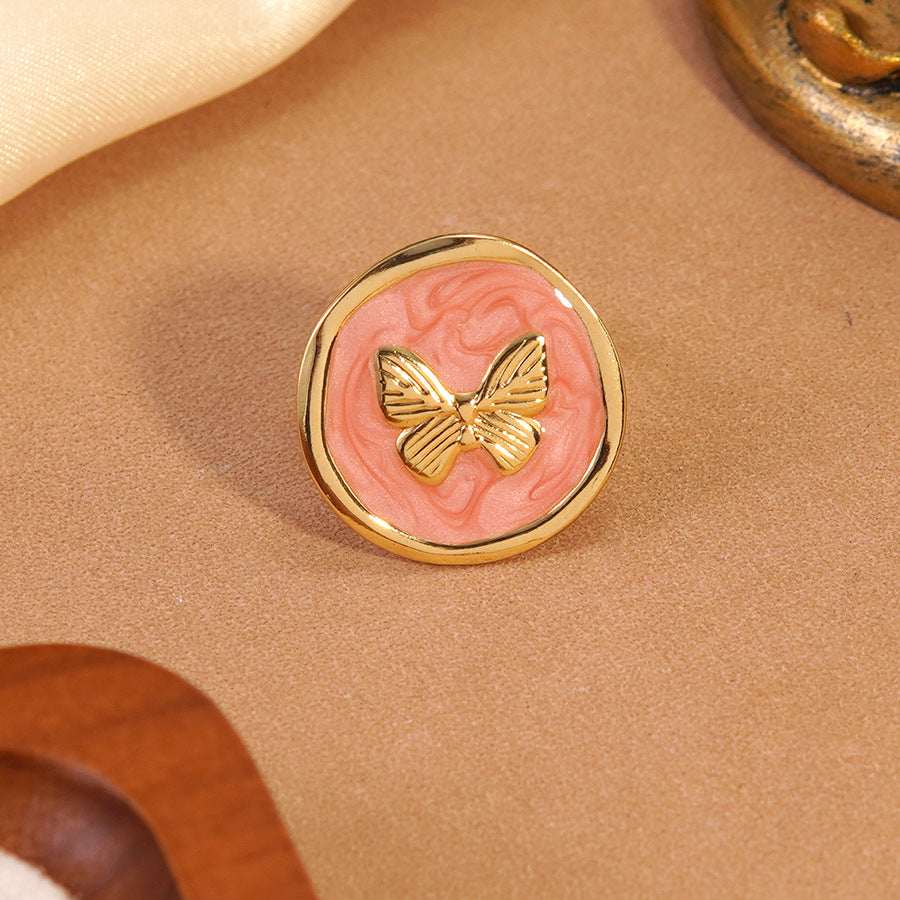 Anello Tondo in Acciaio Inossidabile con Farfalla Geometrica e Goccia Dolce