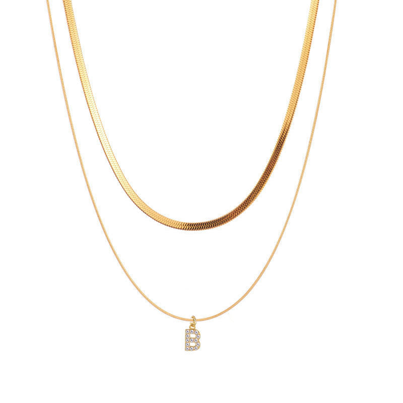 Collana a doppia catena minimalista in acciaio al titanio con intarsio di strass e ciondolo a forma di lettera, unisex