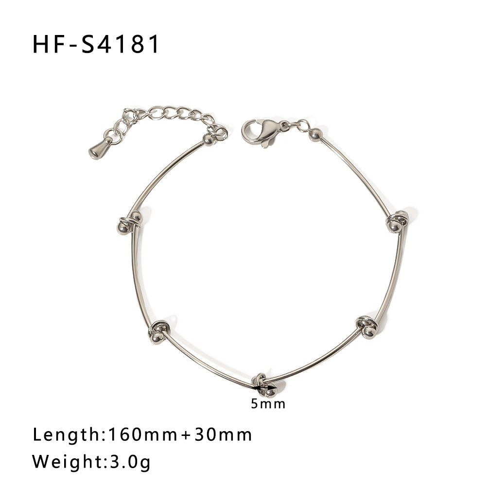Bracciale vintage con farfalla e ciondolo rotondo in acciaio inossidabile con intarsio di strass e dettagli in perle