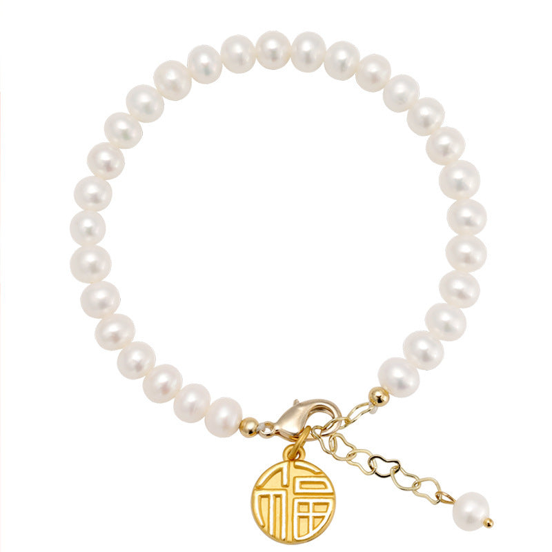 Bracciale minimalista geometrico in acciaio al titanio con pendente a carattere "Fu" placcato oro 18K e nappe di perle