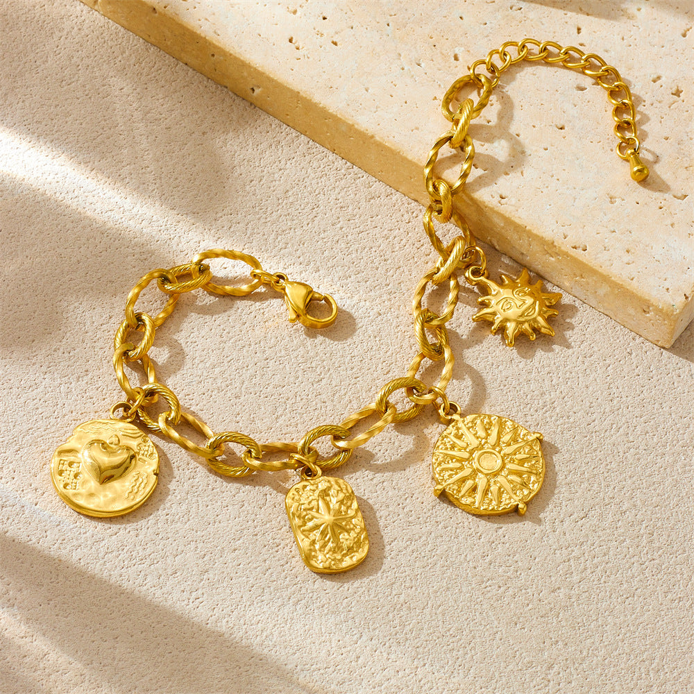 Bracciale in acciaio inossidabile da donna con ciondolo a forma di cuore e sole irregolare placcato oro vintage alla moda