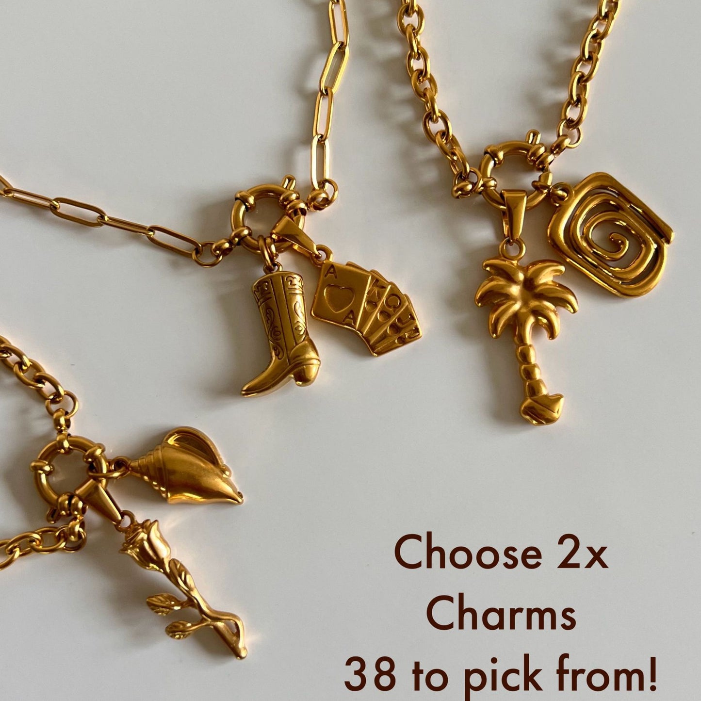 Collana casual in acciaio al titanio placcato con ciondoli a croce, stella e cuore, unisex