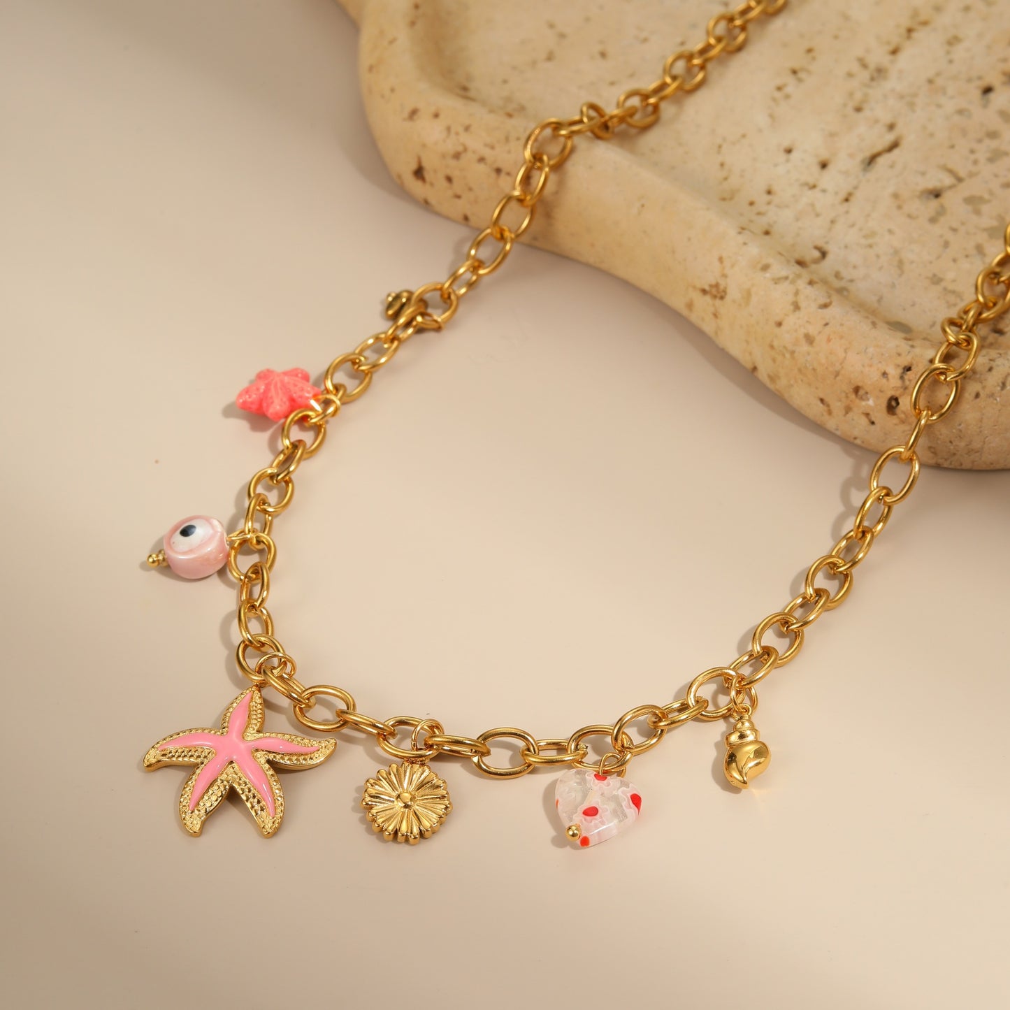 Elegante collar con colgante de acero inoxidable con forma de estrella y acabado chapado para mujer