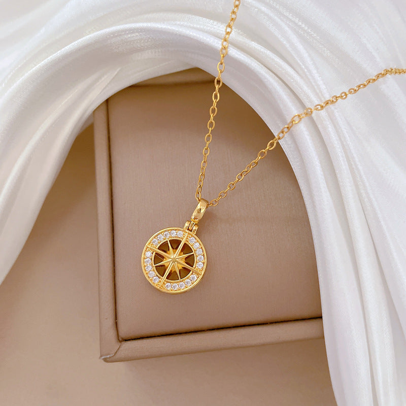 Collana unisex con ciondolo a fiore a stella geometrico in acciaio al titanio di lusso con strass