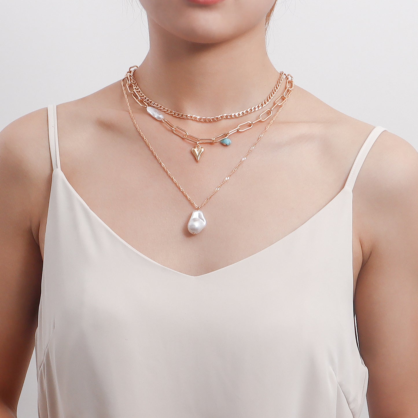 Trendy Multi-Layer Asymmetrical Pearl-Effect Heart Pendant Necklace for Women in Alloy with Plated Finish