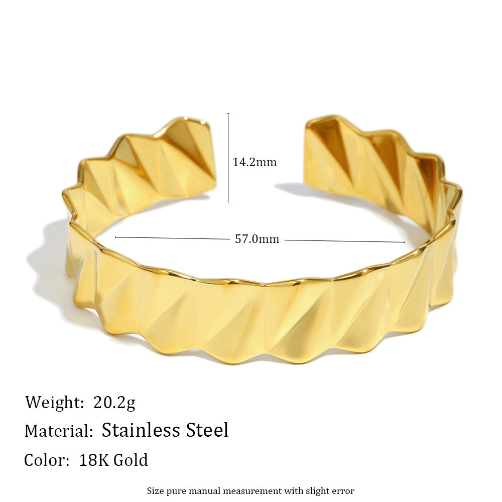 Bracciale da donna rigido in acciaio inossidabile placcato oro 18K con motivo a onda geometrico minimalista alla moda