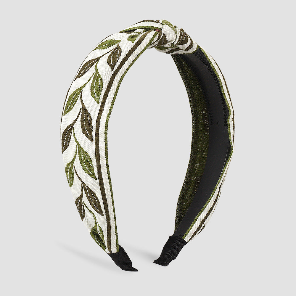 Diadema minimalista de tela para mujer con motivo floral y de hojas bordado