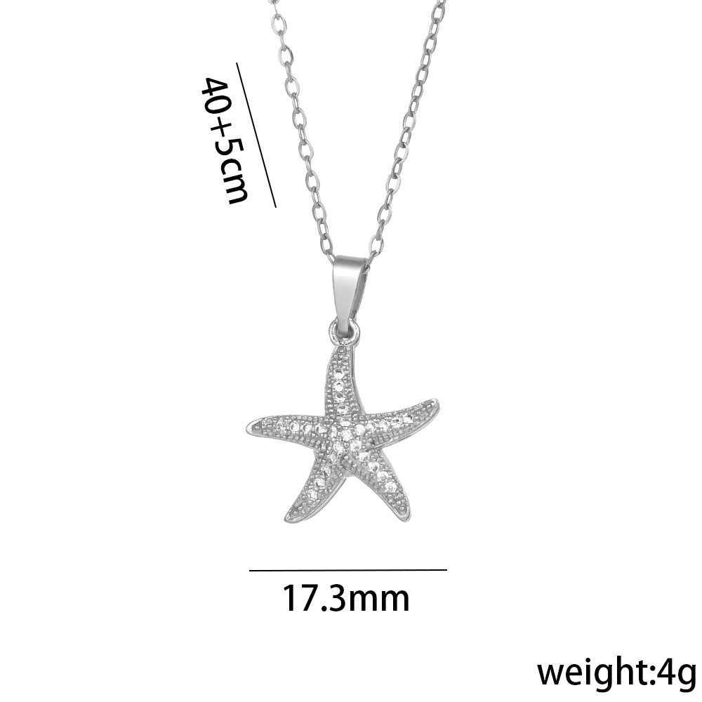 Collana con ciondolo a stella geometrica e perla da donna in acciaio al titanio con zirconi micro-incastonati e finitura galvanica