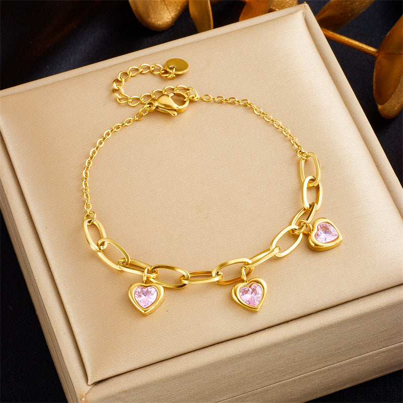 Bracciale a catena irregolare minimalista con ciondolo a cuore intarsiato di strass in acciaio inossidabile placcato oro da donna