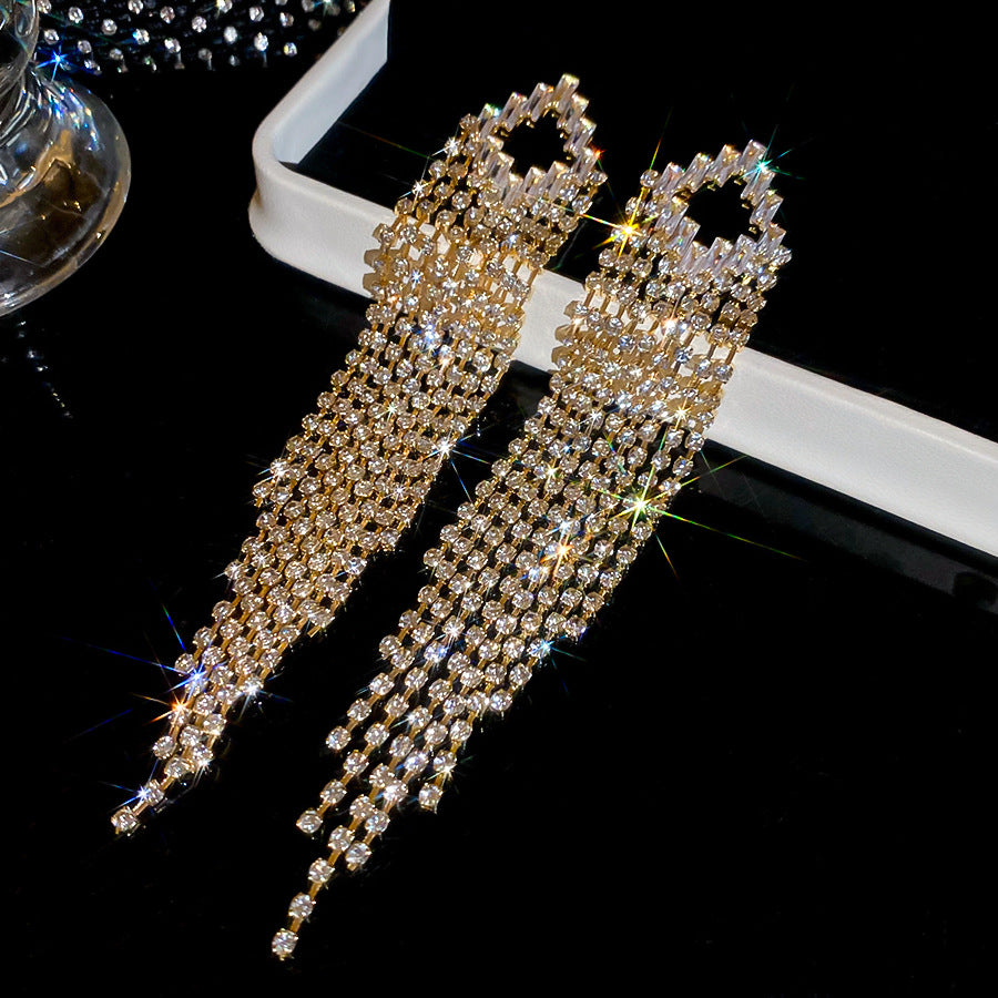 Pendientes colgantes geométricos elegantes en forma de rombo con incrustaciones de circonitas en base de cobre y postes de acero inoxidable para mujer