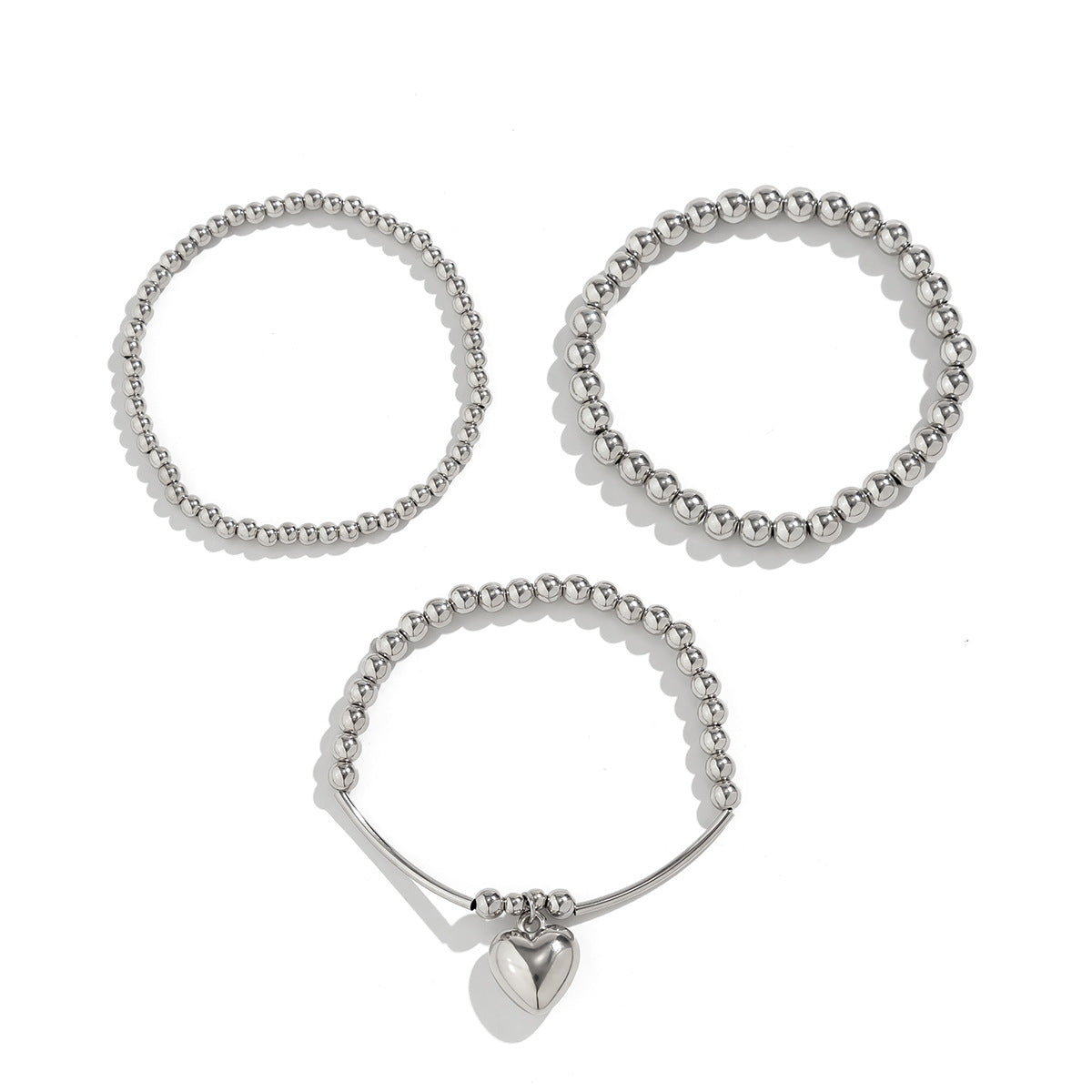 Bracciale da donna in lega con ciondolo a cuore minimalista, finitura placcata e dettaglio a catena