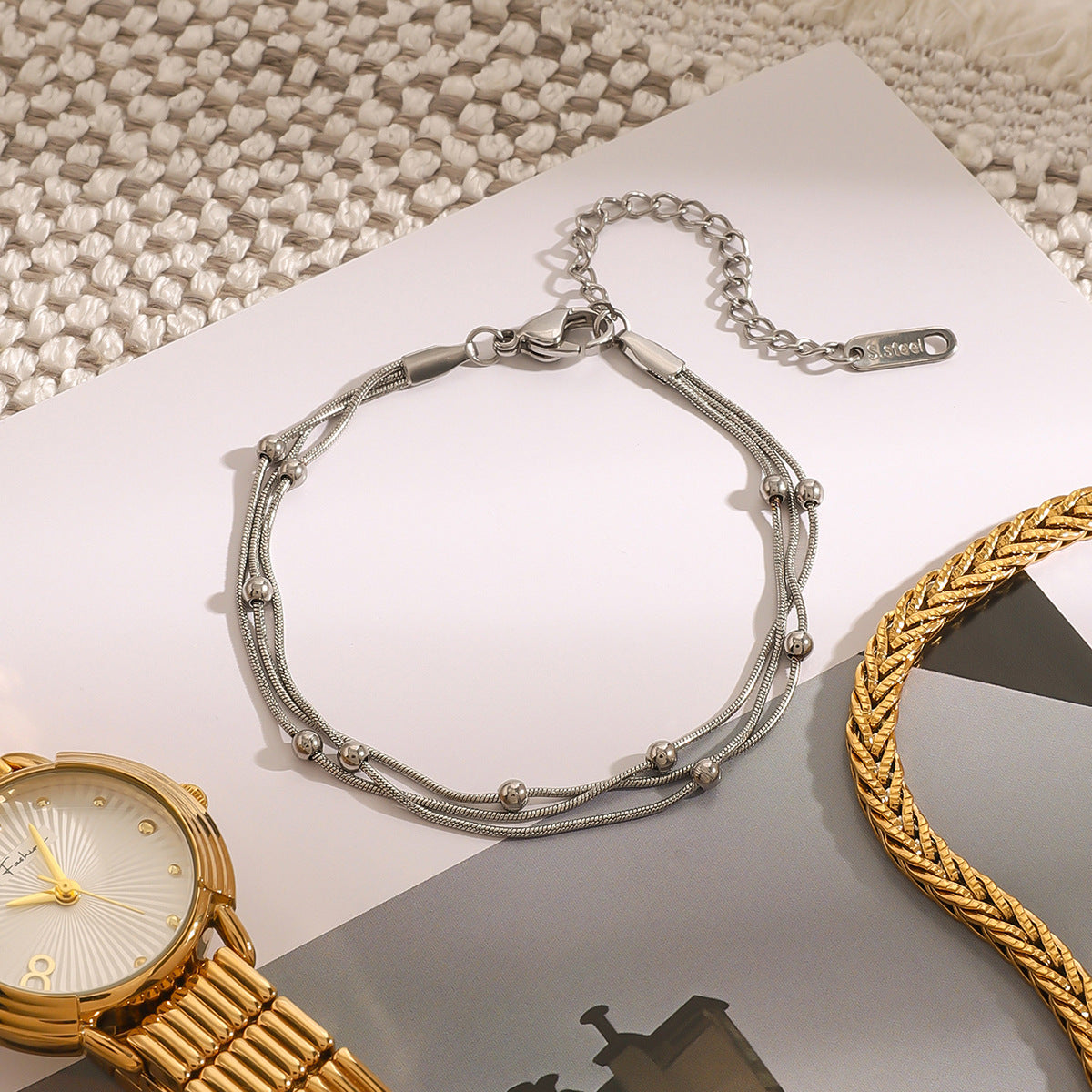 Pulsera apilable multicapa de acero inoxidable chapado en oro con diseño lineal geométrico para mujer