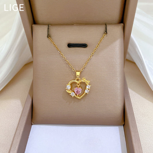 Elegante collar con dije de corazón y moño para mujer, cadena de acero inoxidable con detalles de diamantes de imitación, diseño geométrico minimalista