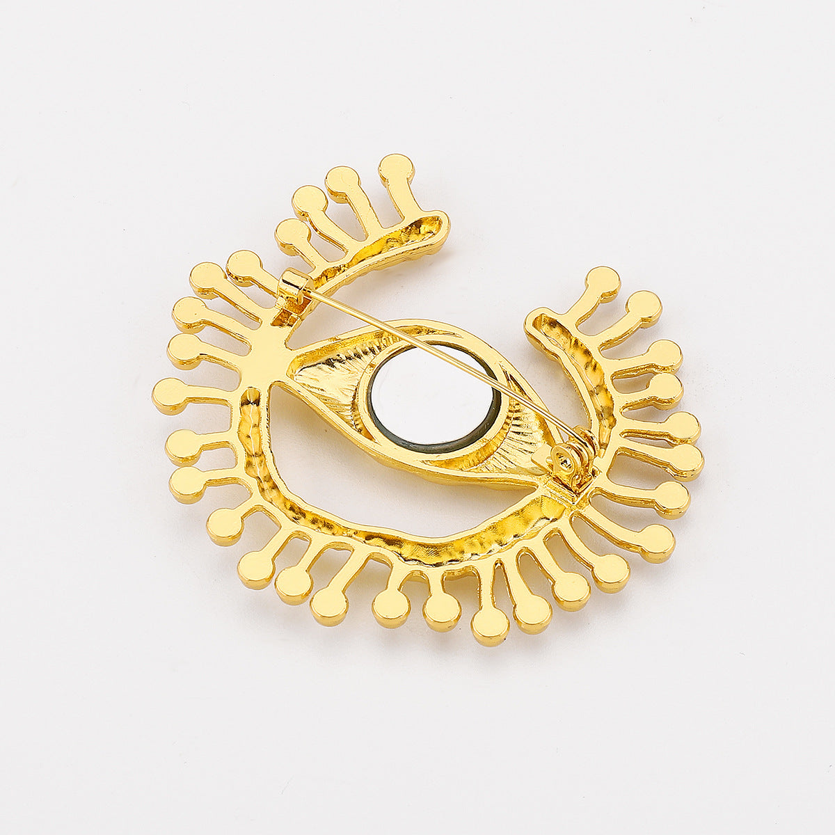 Broche de aleación ojo azul de estilo de personalidad única con incrustaciones de diamantes de imitación para mujer