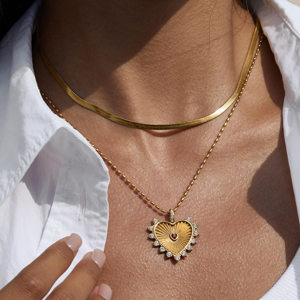 Collana con ciondolo a cuore geometrico in titanio e catena in acciaio inossidabile galvanizzato per donna