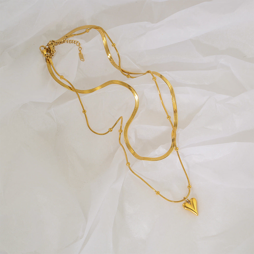 Collar colgante de corazón doble minimalista en acero inoxidable con acabado chapado para mujer y hombre