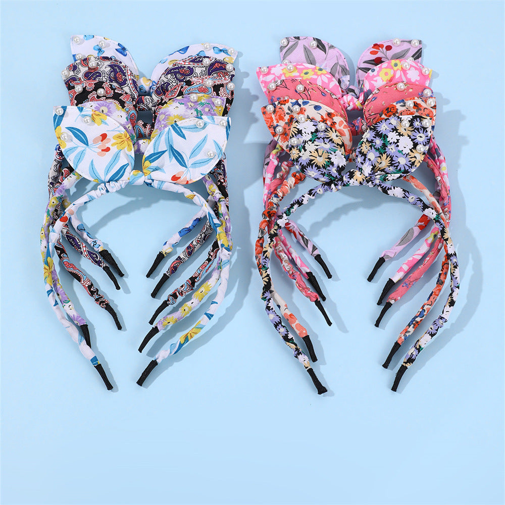 Bonito conjunto de diademas en forma de lazo para niñas con banda de tela y adornos de perlas, patrón floral estilo princesa