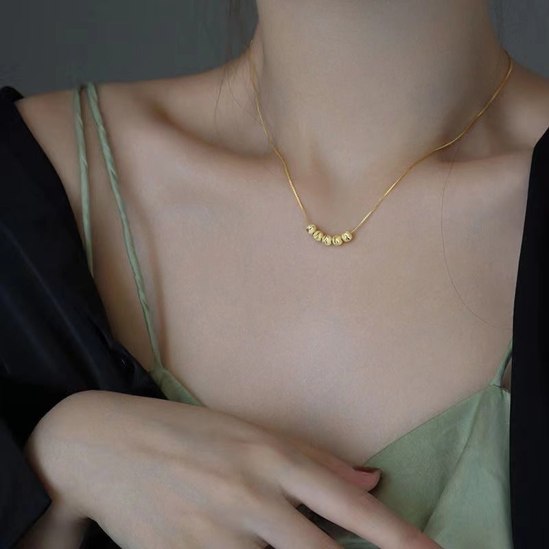 Minimalist Geometric Titanium Steel Box Chain Necklace with Gold-Plated Beads and Round Pendant