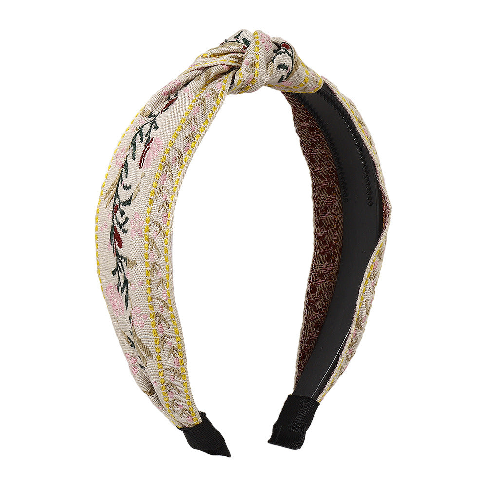 Diadema minimalista de tela para mujer con motivo floral y de hojas bordado