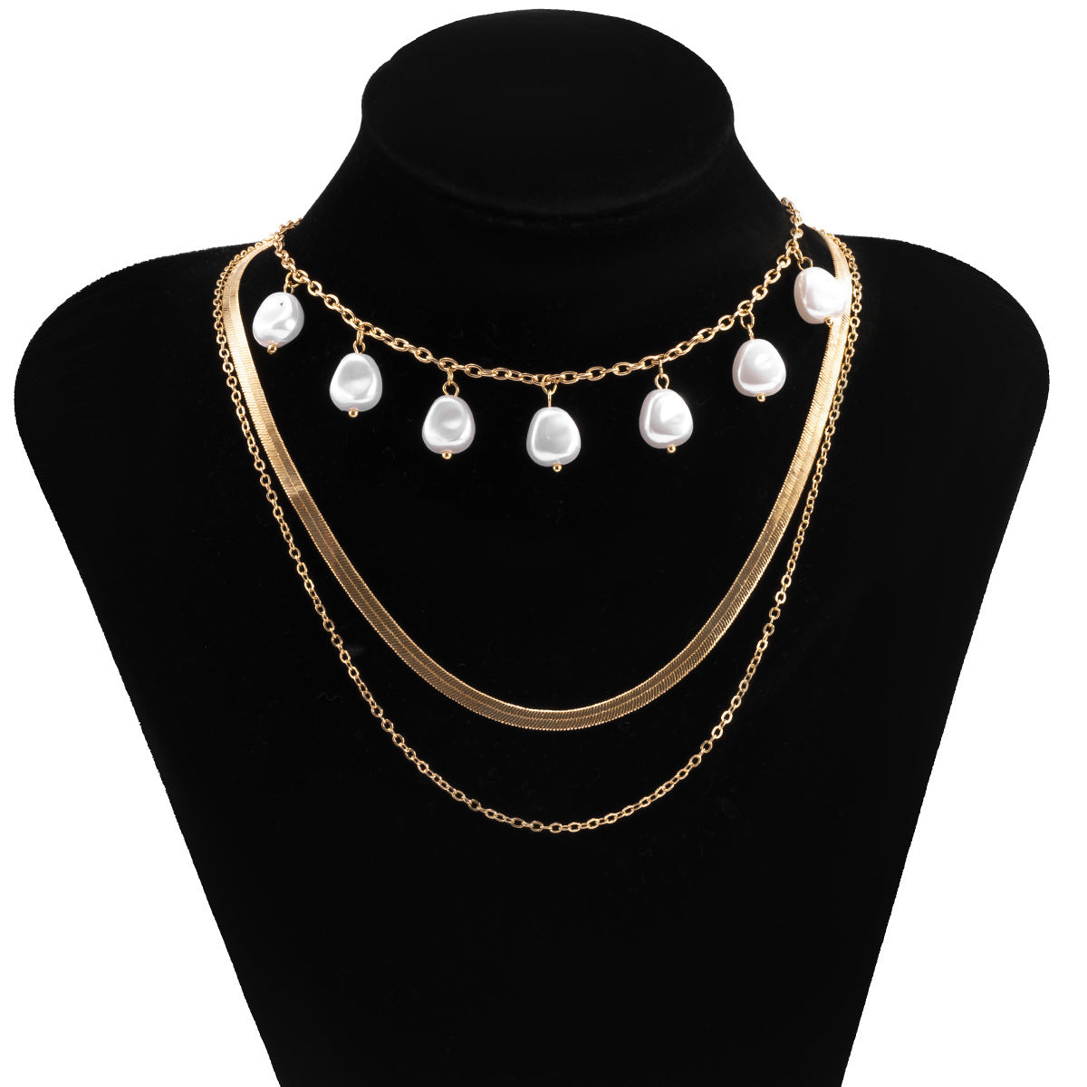 Collana girocollo vintage da donna con perle geometriche, catena a serpente e nappina.