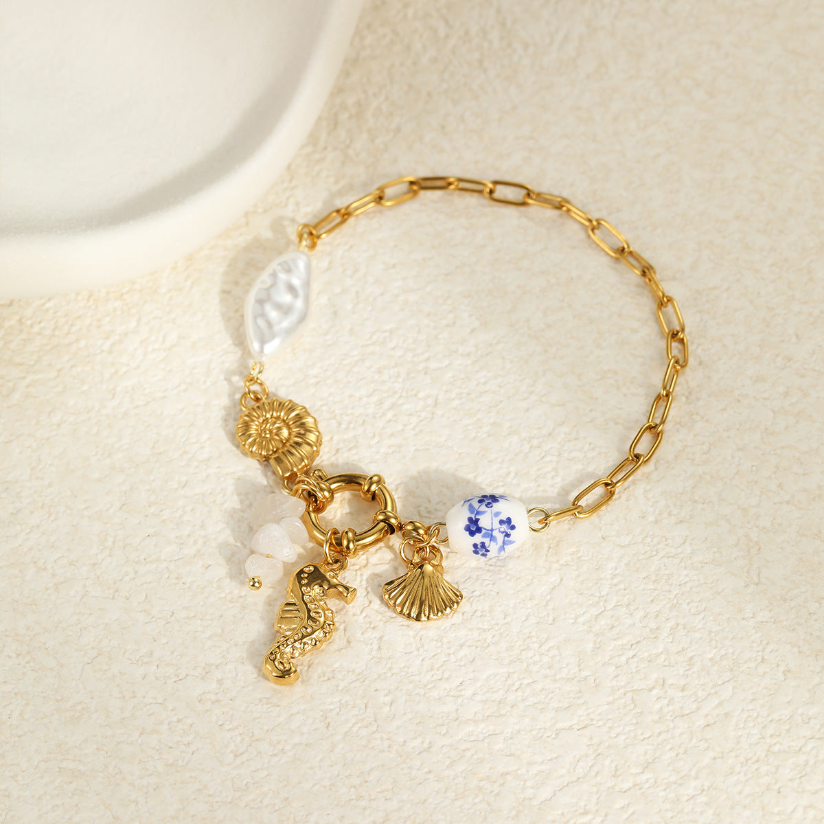 Fashionable Ocean Vacation Style Seashell and Shell Shaped Stainless Steel Bracelet with Geometric Design and Plated Finish for Women