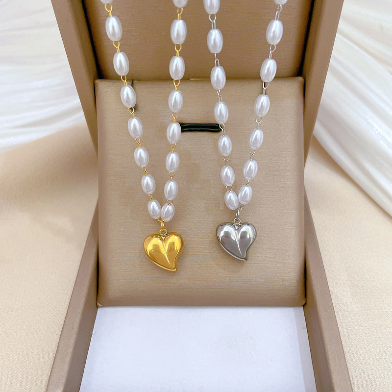 Collar con Colgante Geométrico de Corazón de Acero y Titanio Minimalista con Acento Floral