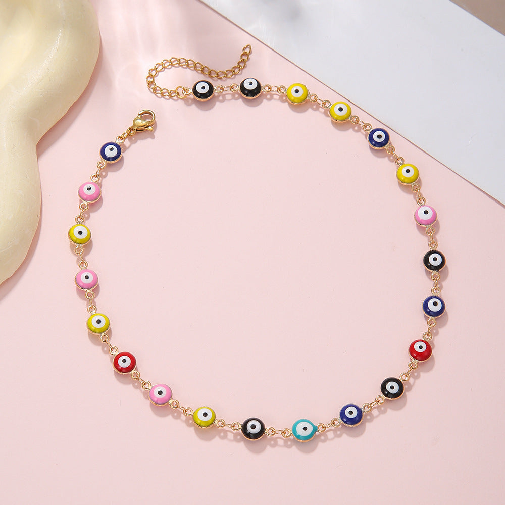 Cavigliera e braccialetto in acciaio inossidabile in stile bohémien colorato con occhio di Allah e motivi geometrici e a cuore