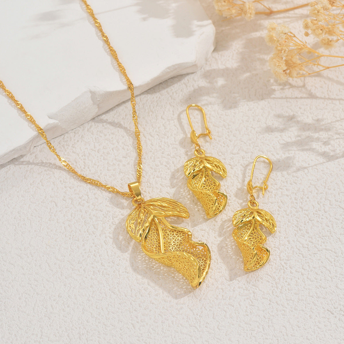 Parure di collana e orecchini da donna placcati in lega di zinco a forma di foglia, in stile minimalista