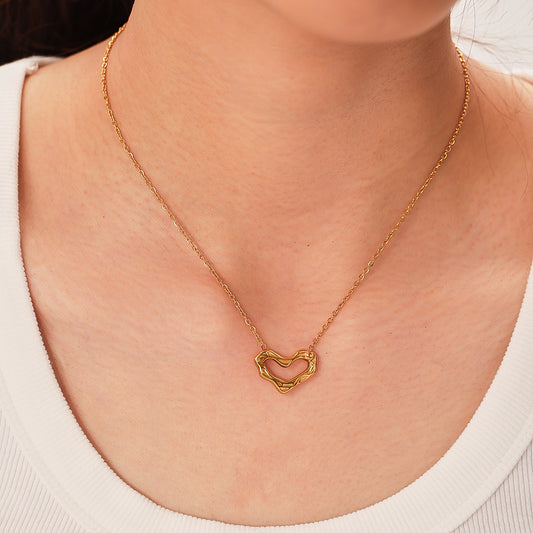 Irregular Hollow Heart-Shaped Pendant Necklace for Women in Stainless Steel with 18K Gold Plating